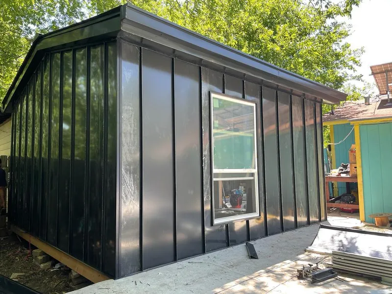 Black standing seam metal wall panels for Roof Inspection in Simpsonville